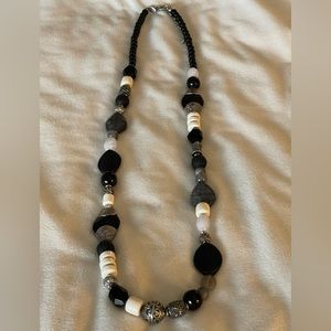 Chico’s long black, silver and cream beaded necklace